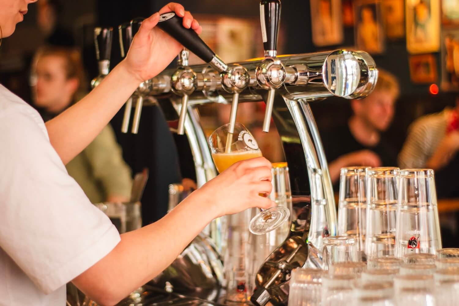 Pouring beer from tap